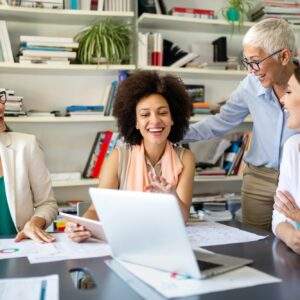 Group of business people working together in software development and designer office