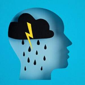 Papercut head, adult depression concept. Mental health problems, psychology, mental illness